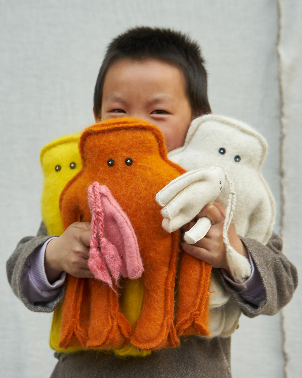 Orange Yeti Toy. Sustainably made felt toys from b-corp Norlha Atelier
