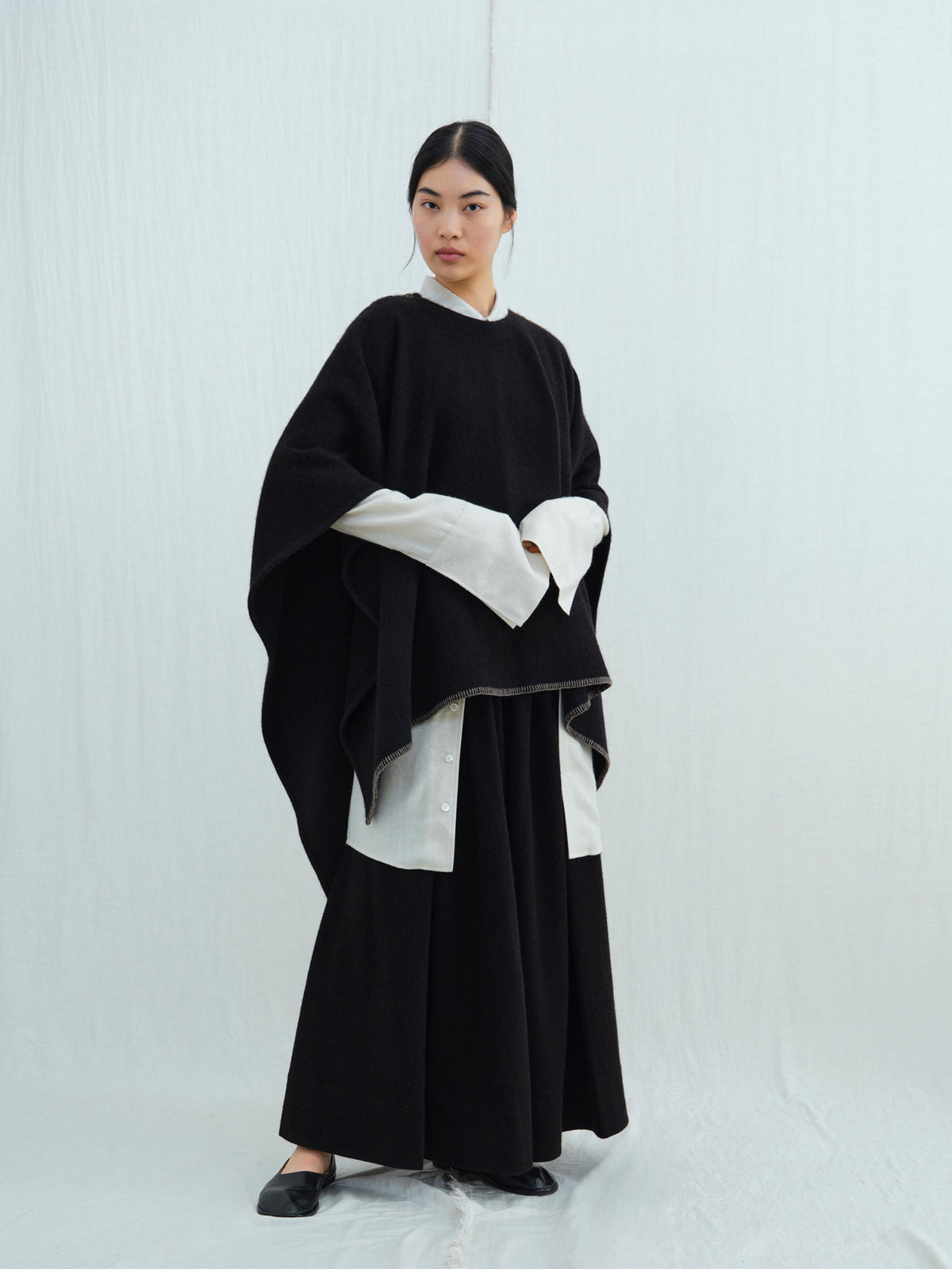 Round-Neck Sleeved Yak Wool Poncho. Luxury Yak Wool Ponchos and Capes